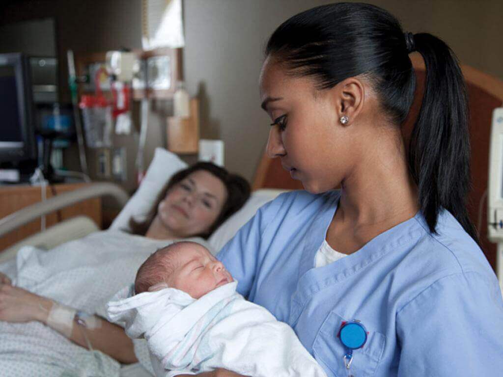 What is a postpartum nurse